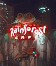 The Rainforest Cafe. Note the distant Hancock lit in green. (click to zoom)