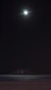 Full moon and distant storm. (click to zoom)