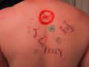 Kelly's temporary tattoos on Andrew. 