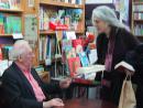 Women&Children First: Studs Terkel signing his book. (click to zoom)