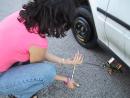 Elizabeth sharing the tire changing experience. (click to zoom)