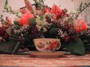 Floral arrangement, china and tablecloth. (click to zoom)