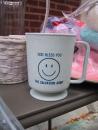 Andersonville giant yard sale: God Bless You smiley mug. (click to zoom)