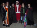 Suburban Halloween sights: Witches and Santa. (click to zoom)