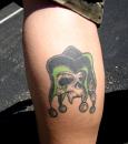 Gwen's jester skull tattoo. (click to zoom)