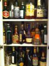 My non-drinking cousin keeps an excellent liquor cabinet. (click to zoom)